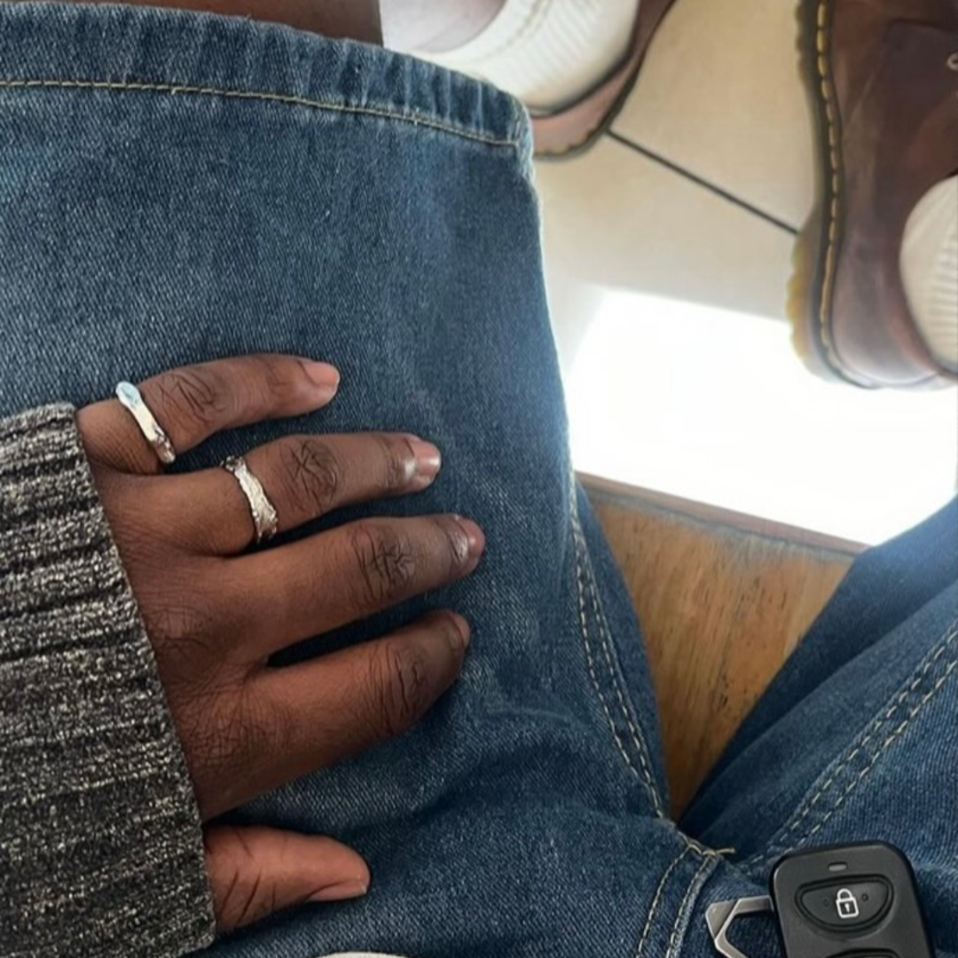 pov picture of a hand wearing monateo rings